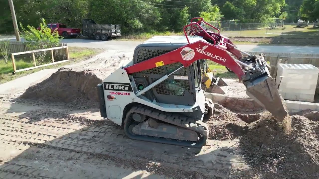 Stem Wall Foundation with Takeuchi TL8R2 and ASV RT-40