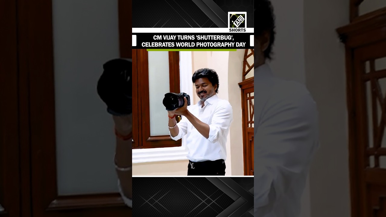 Tamil Nadu CM Vijay turns shutterbug, celebrates World Photography day with press photographers