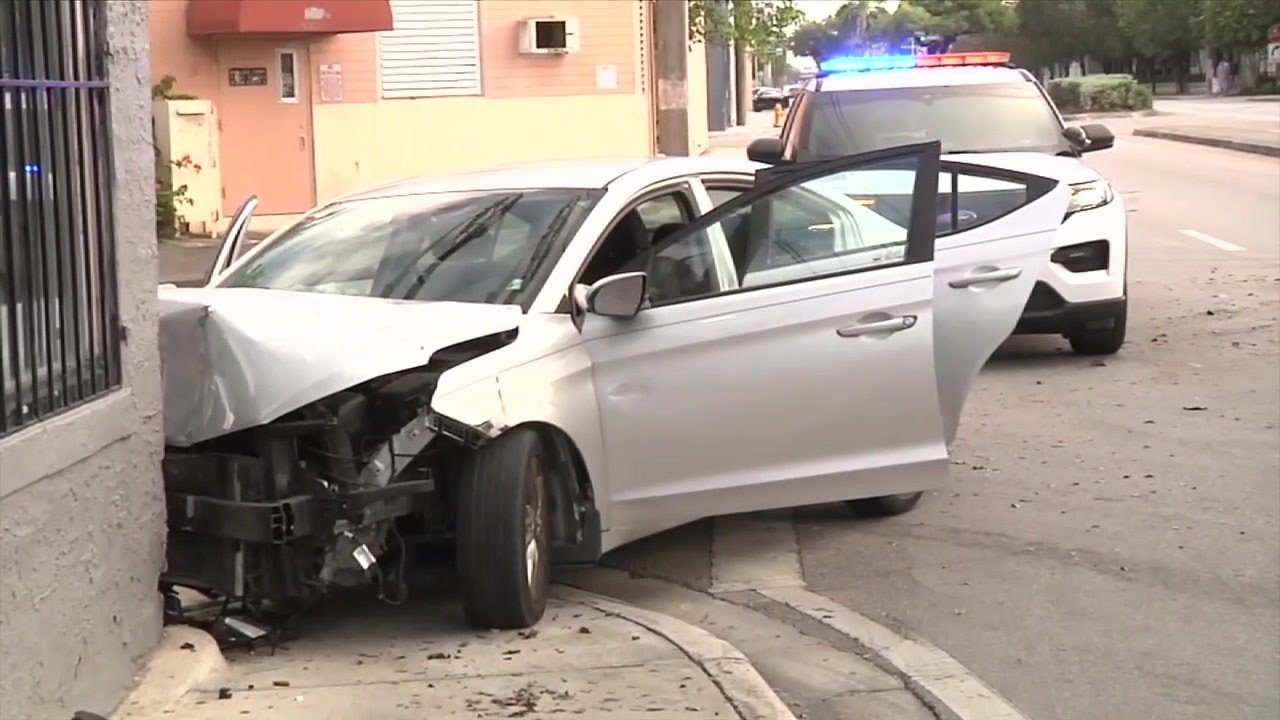 3 detained after armed carjacking in Miami leads to crash into empty building, bailout