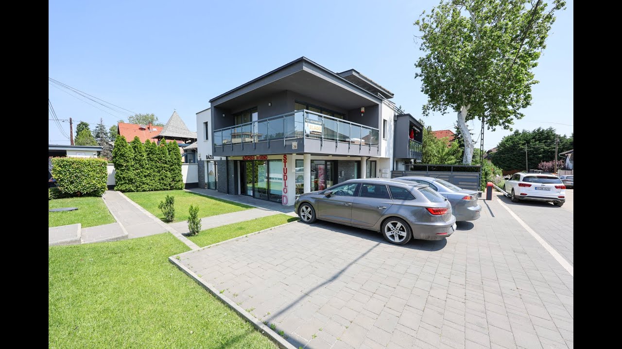 Érd, Városközpontban egy újszerű, 86.3 m2-es, 3 szoba + nappalis lakás, nagy terasszal és parkolóval
