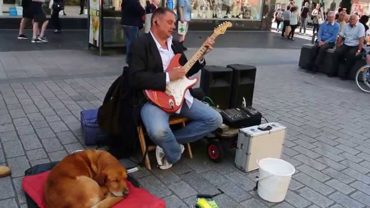 ANDY J THE BLIND GUITARIST IN LIVERPOOL PLAYS YNWA