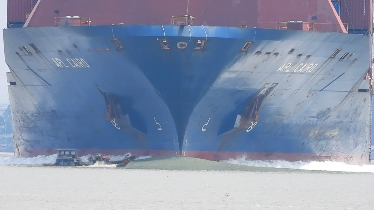 Daring Wooden Boat Challenges Huge Oncoming Container Ship