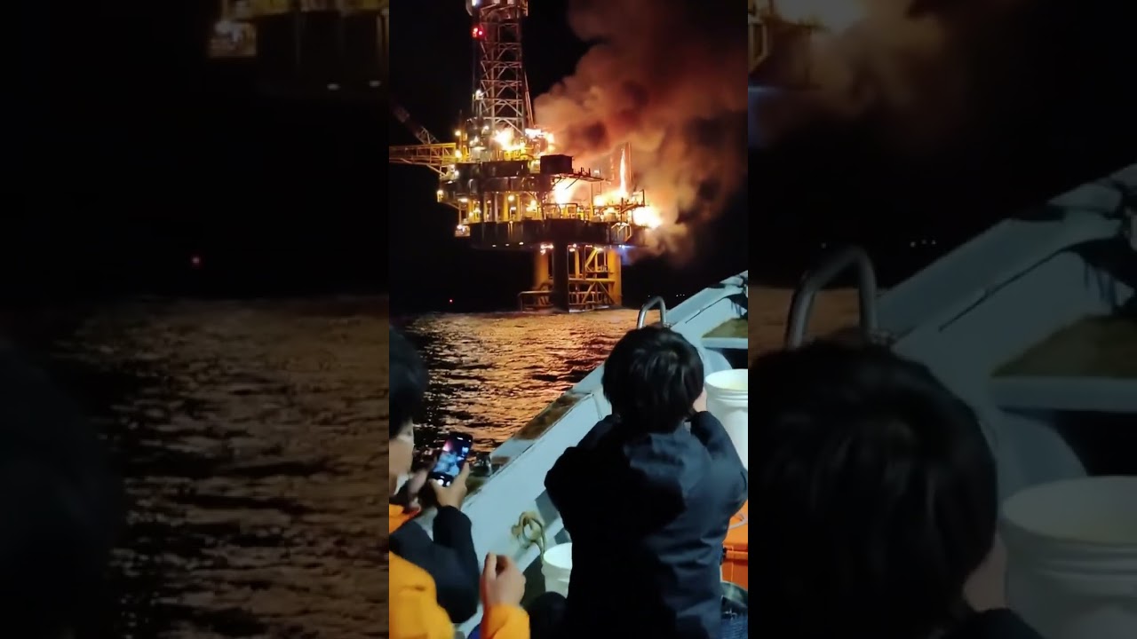 Massive fire erupts on an offshore oil rig.