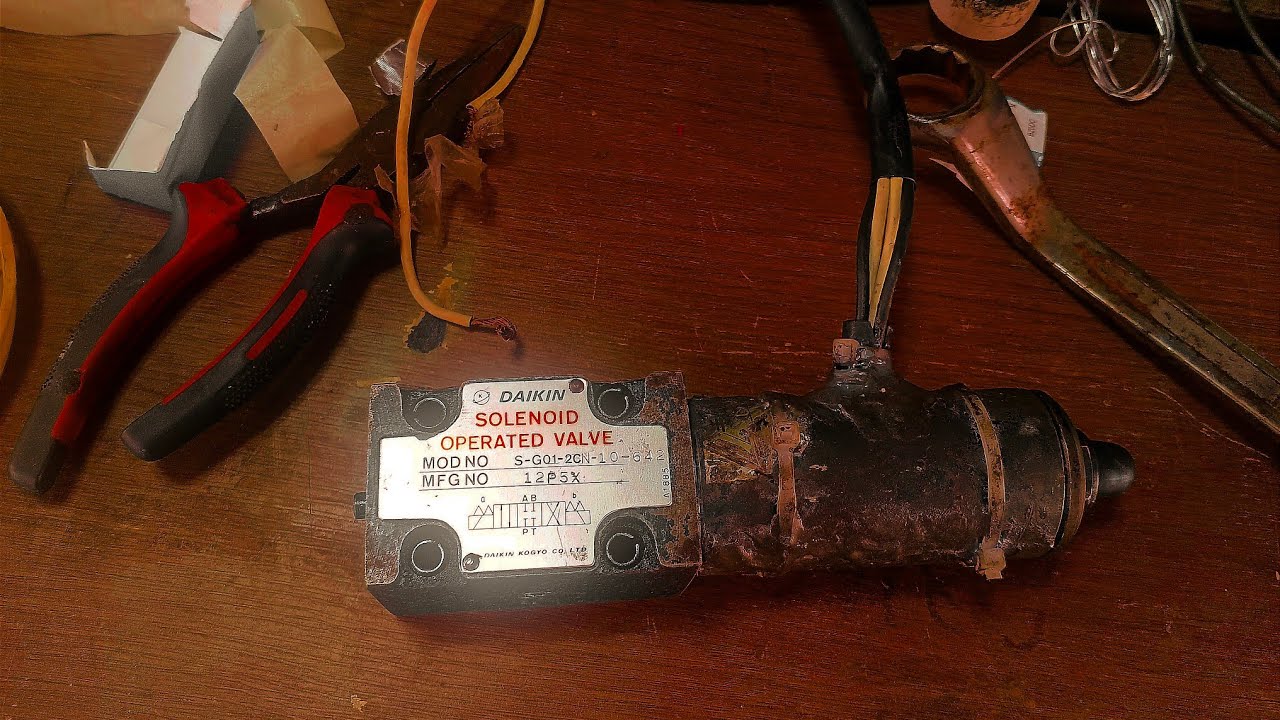 Tutorial How to Repairing back hoe swing motor SOLENOID VALVE 