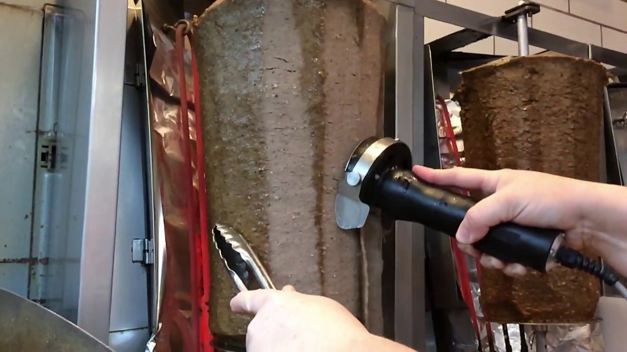 Gyros meat slicing with Dost 80 electric knife.