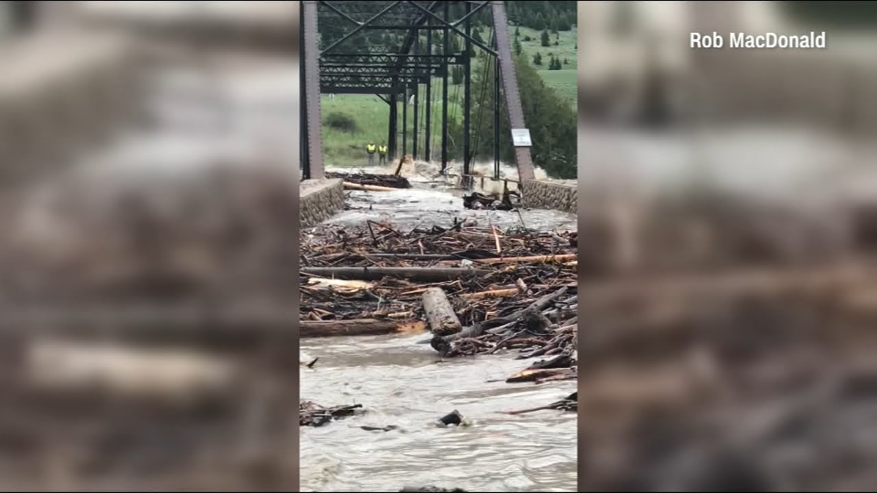 Yellowstone flooding sweeps away bridge, washes out roads