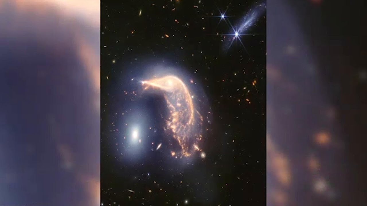 New image of merging galaxies marks two years of NASA space telescope mission