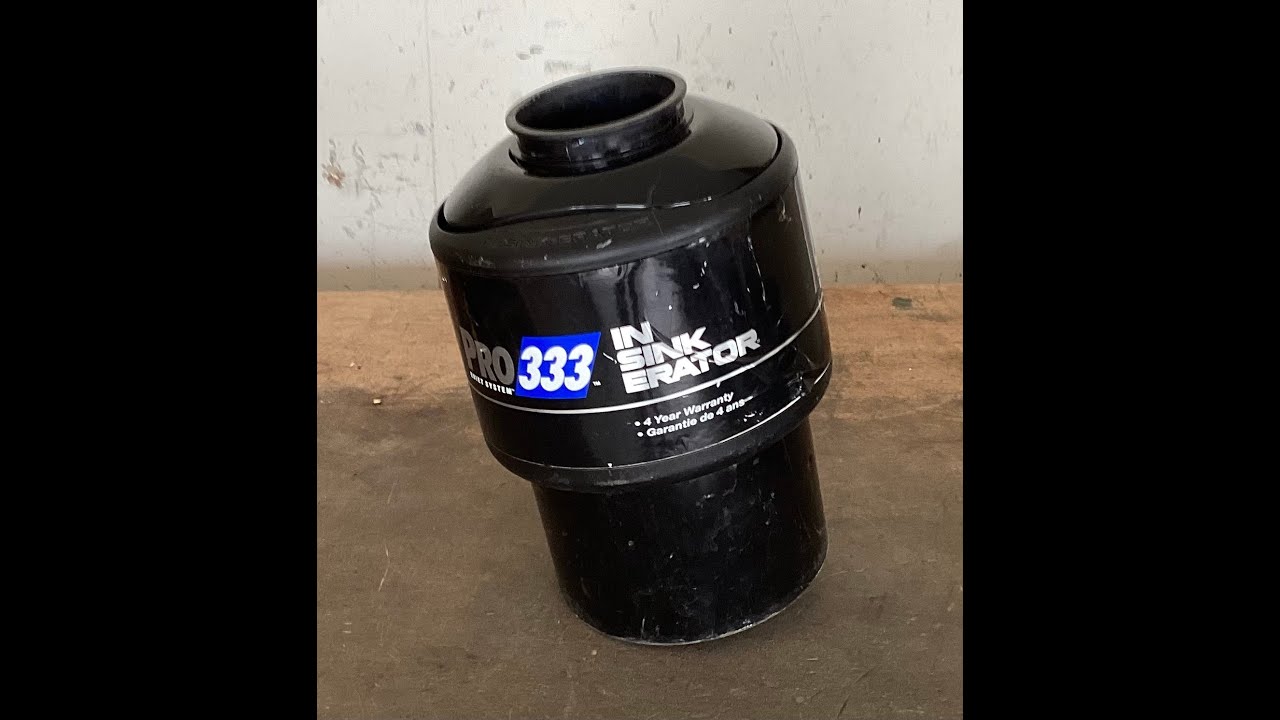 Scrapping a garbage disposal unit for copper, tin, and other metals.