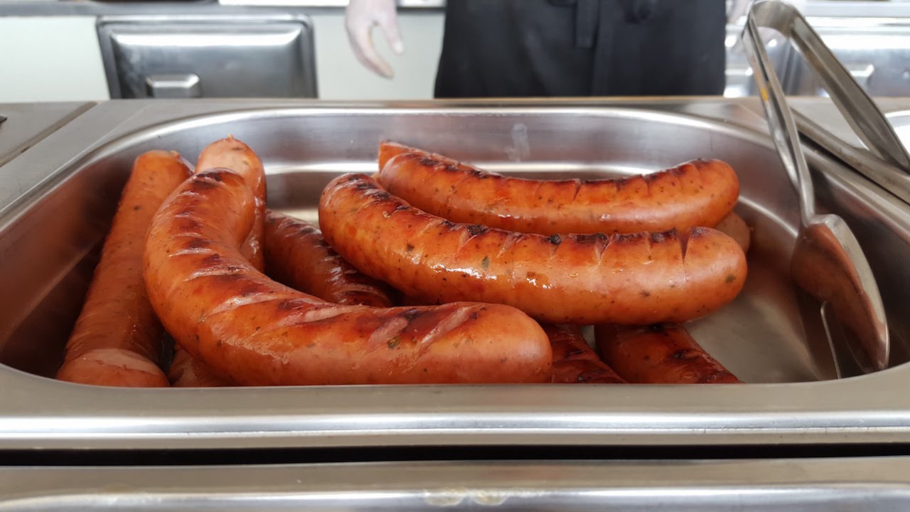 Eating Polish Kielbasa Sausage at Wroclaw Good Beer Festival