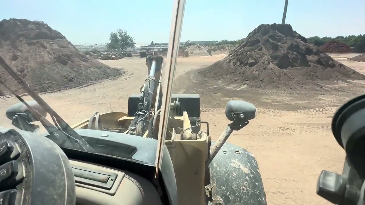 POV working life learning how to operate a front end loader and loading customers!