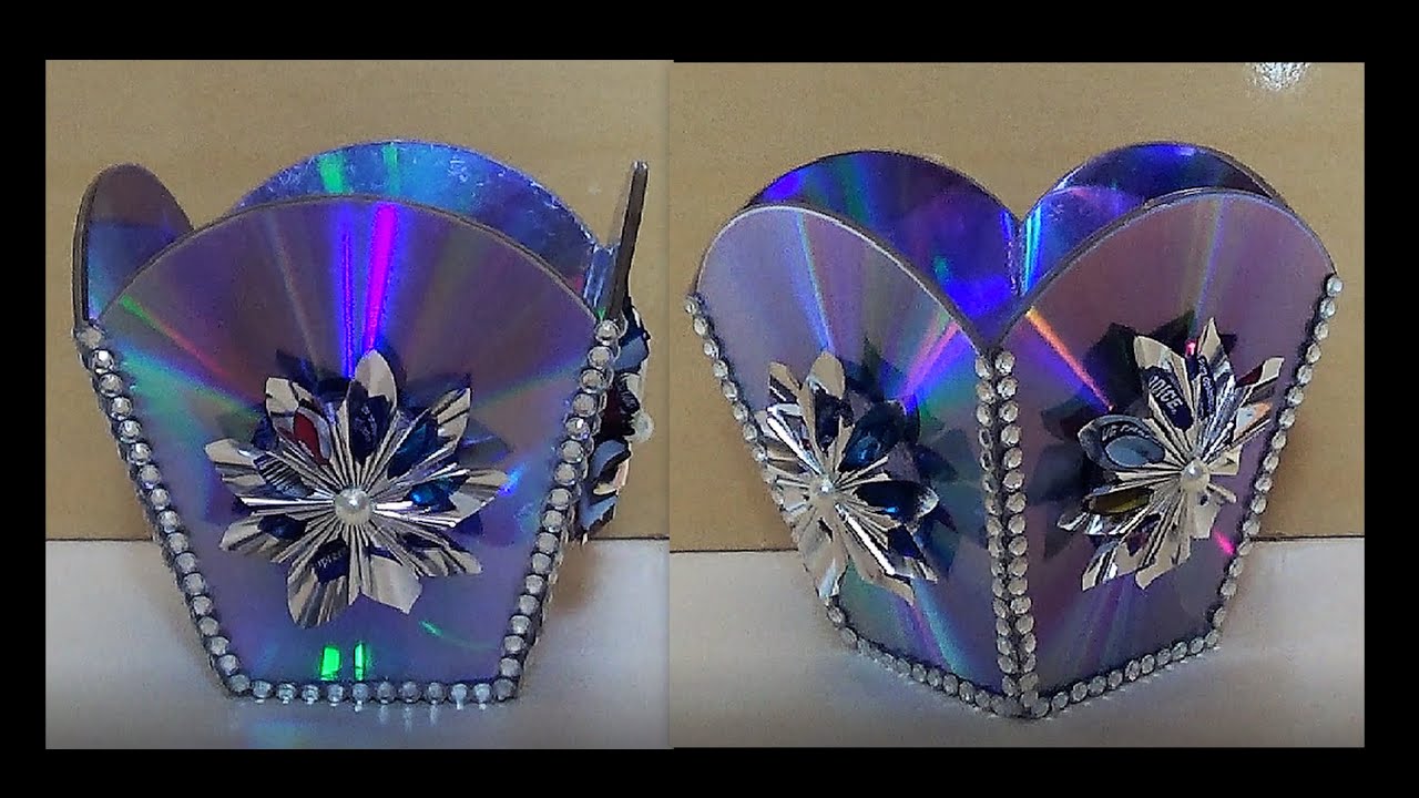 IDÉIA CRIATIVA COM CDS VELHOS/Artesanato com CDS/ FLOR RÓTULO AGUA SANITARIA