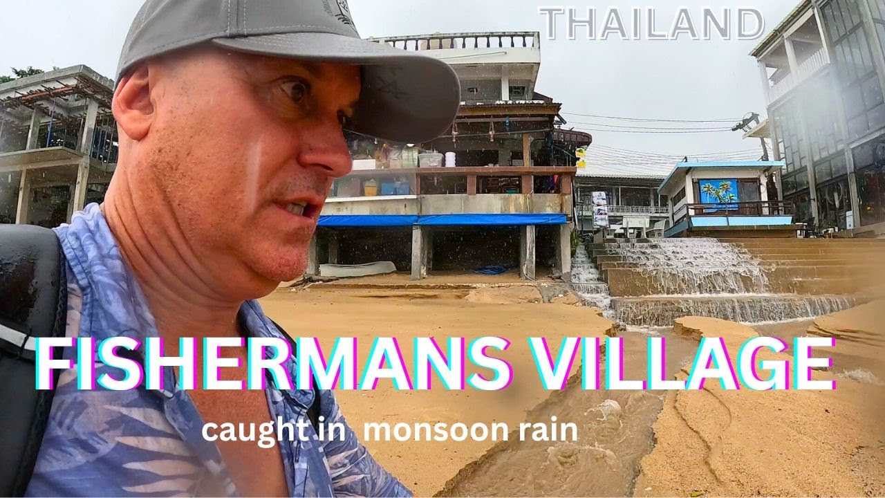 Caught in Monsoon rain . Fisherman's village Koh Samui Thailand.