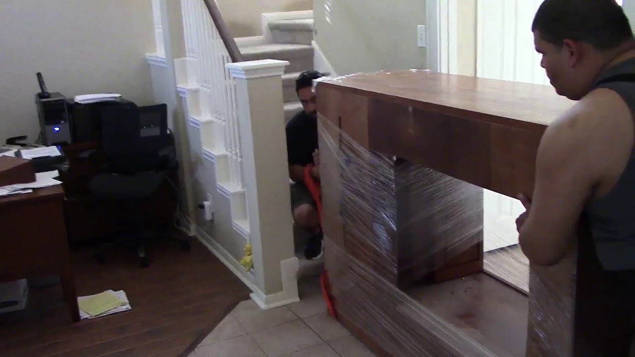 how to move a heavy entertainment center upstairs by Rescue Moving Services