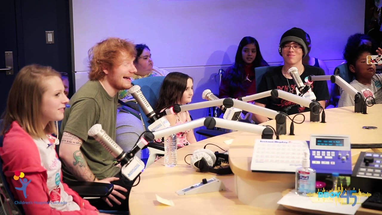 Ed Sheeran talks to kids at Seacrest Studios
