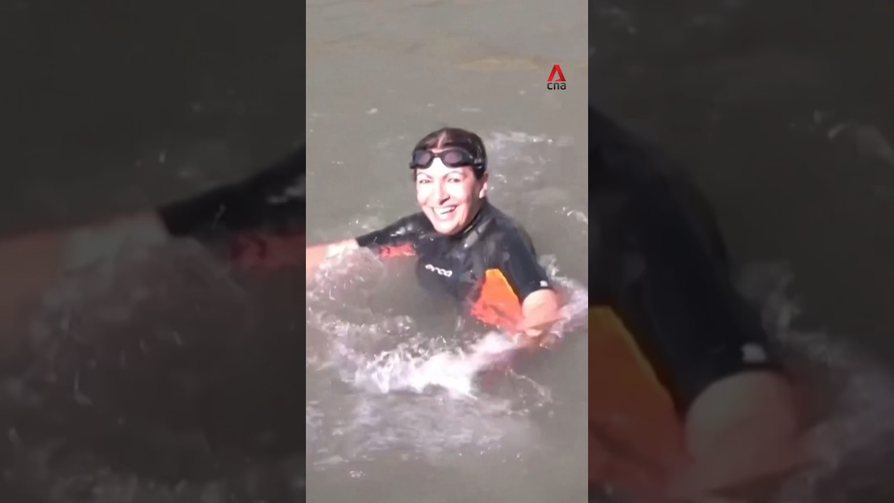 Paris Mayor Anne Hidalgo swims in Seine to prove safety for Olympic