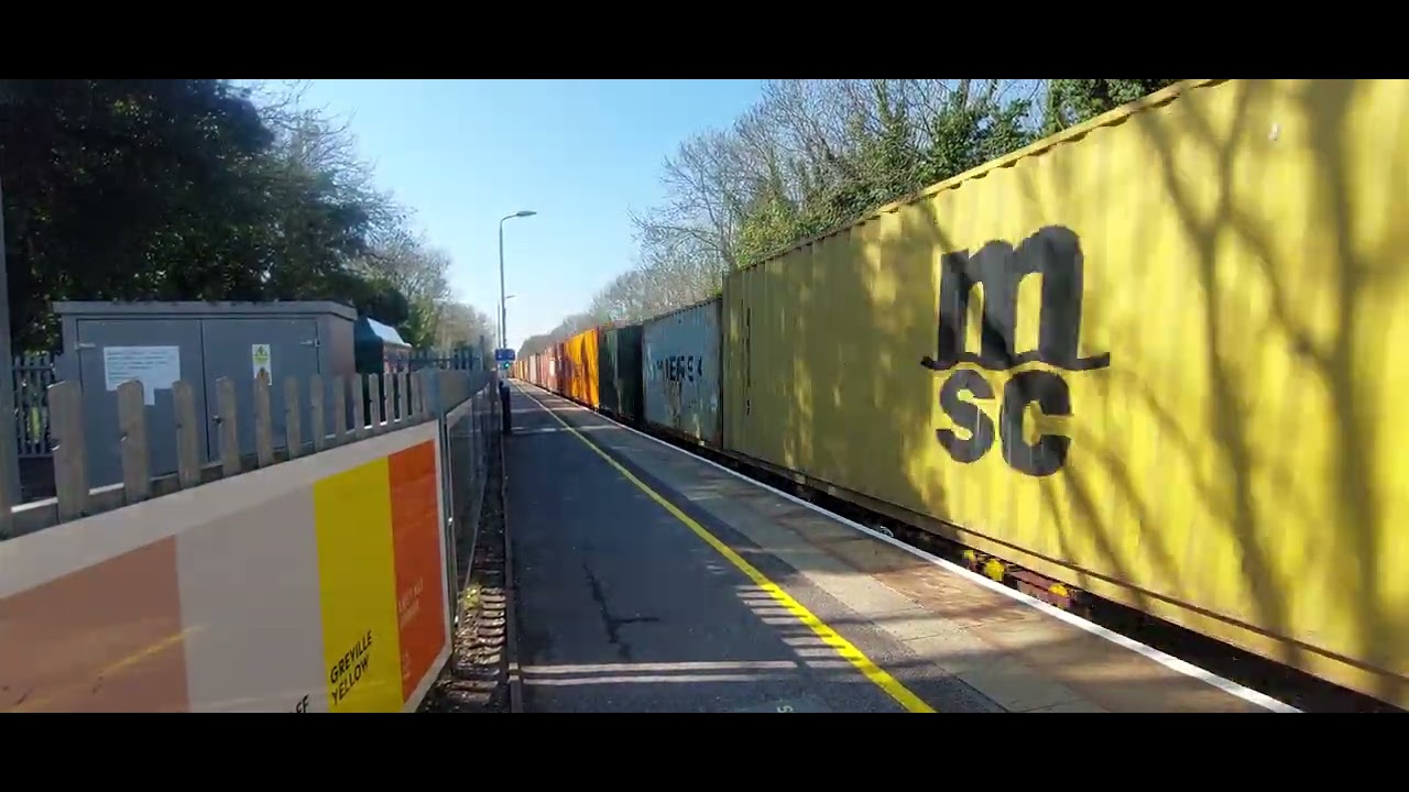 66025 passing through Warwick 