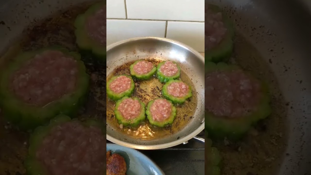 Daddy cooking burgers and bitter melon with pork mince with eggs😋 