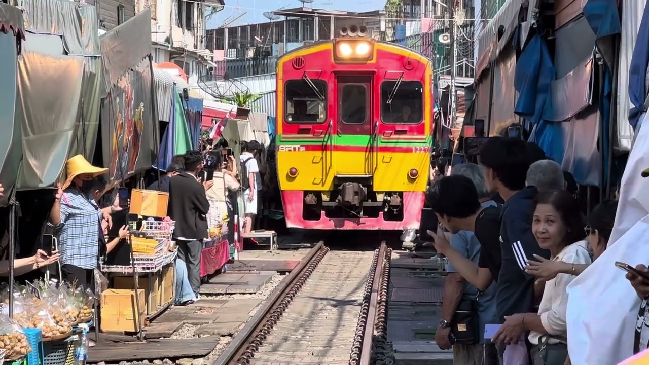 Maeklong Railway Market - “train track market