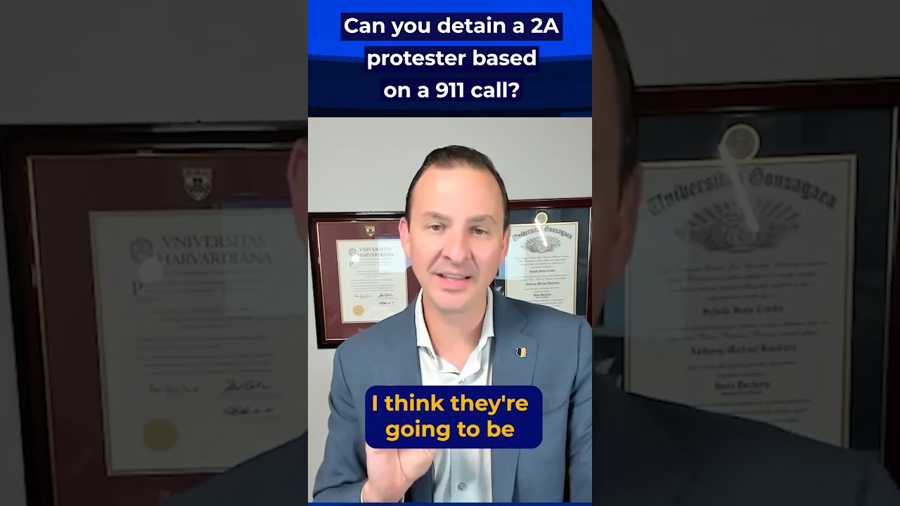 Can police detain 2A protester based on a 911 call?