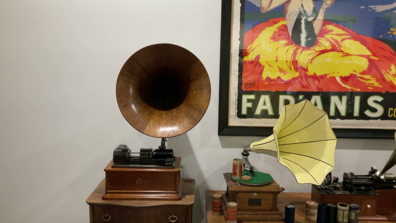 2723.  Listening to music on the Edison Opera