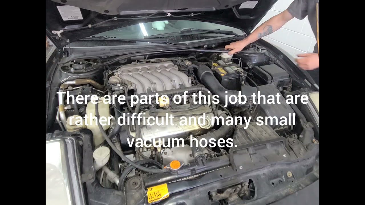 Spark Plugs, Wires, Distributor Cap, Rotor, PCV and Intake Gasket on a 2002 Mitsubishi Eclipse