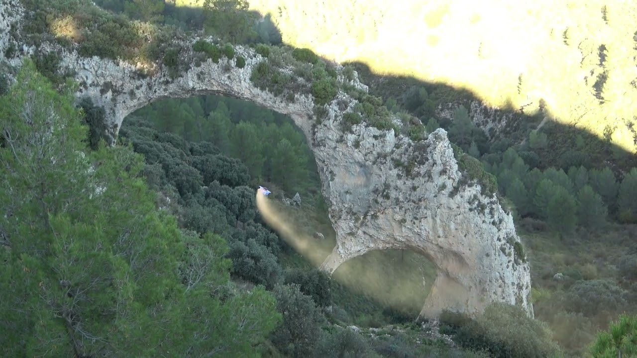 WINGSUIT FLIGHT THROUGH HOLE - ARC CASTELL DE CASTELLS