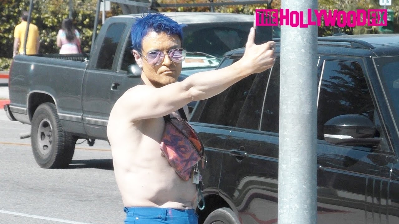 Sexy Vegan From Dr. Phil Goes Shirtless With His Rabbit Before Rocking A Pink Dress In Beverly Hills