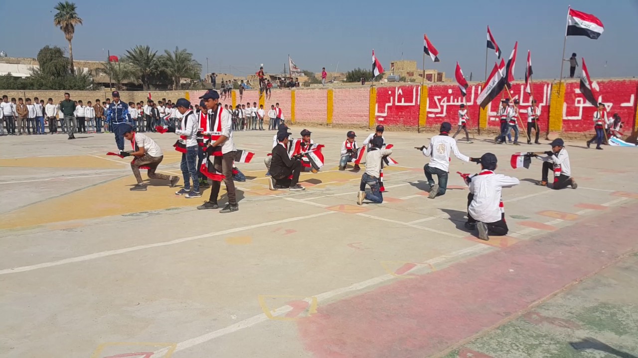 جانب من الاستعراض الذي قدمه تلاميذ مدرسة دمشق الابتدائية للبنين ميسان قضاء المجر الكبير 1