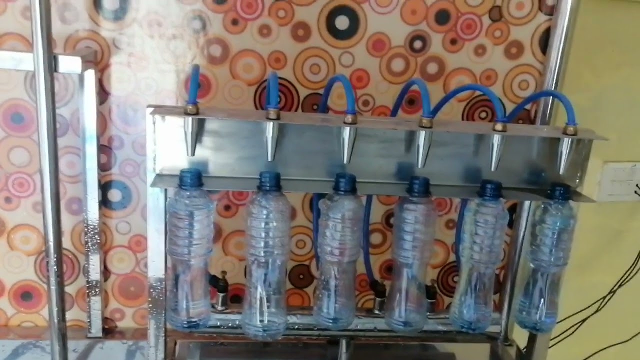 Semi Automatic Filling Table Intelligently Desgined By Samfar Water Technologies +923218445855