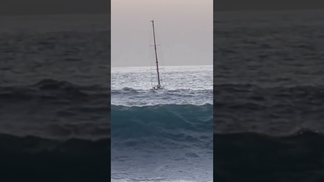 Suddenly big waves surprise a sailing boat in a bay #atlantic #sailing #waves #dangerous