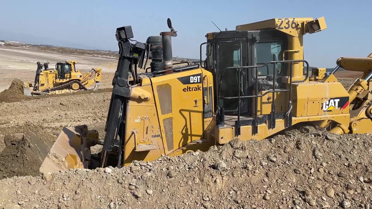 Caterpillar D9T Bulldozers Shaping An Old Mining Site (Reclamation Works)