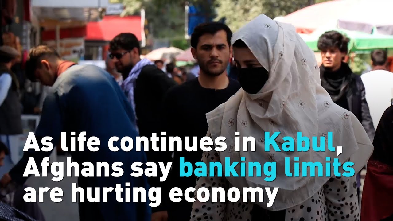 As life continues in Kabul, Afghans say banking limits hurt economy