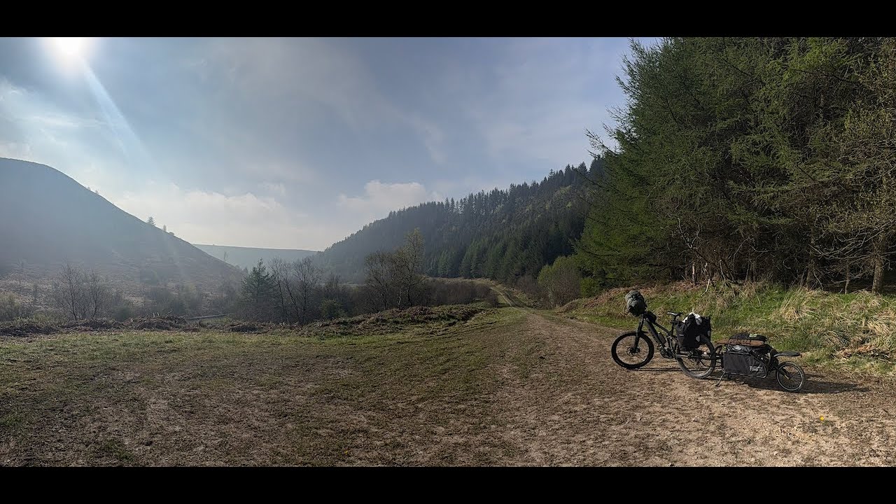 Wild bike camping. Burley Coho XC trailer. Hennessy Hammock. Firebox Freestyle. Diesel trains.