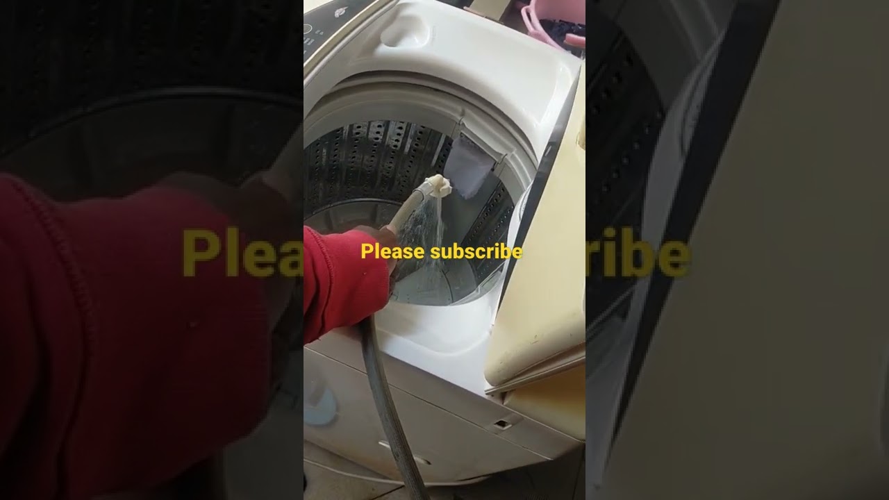 manually filling water into a top load washer