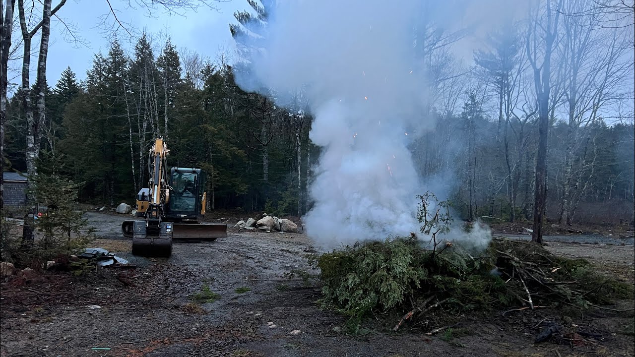 TYPICAL DAY AT THE COTTAGE. CUTTING TREES, HAULING LOGS & BURNING BRUSH