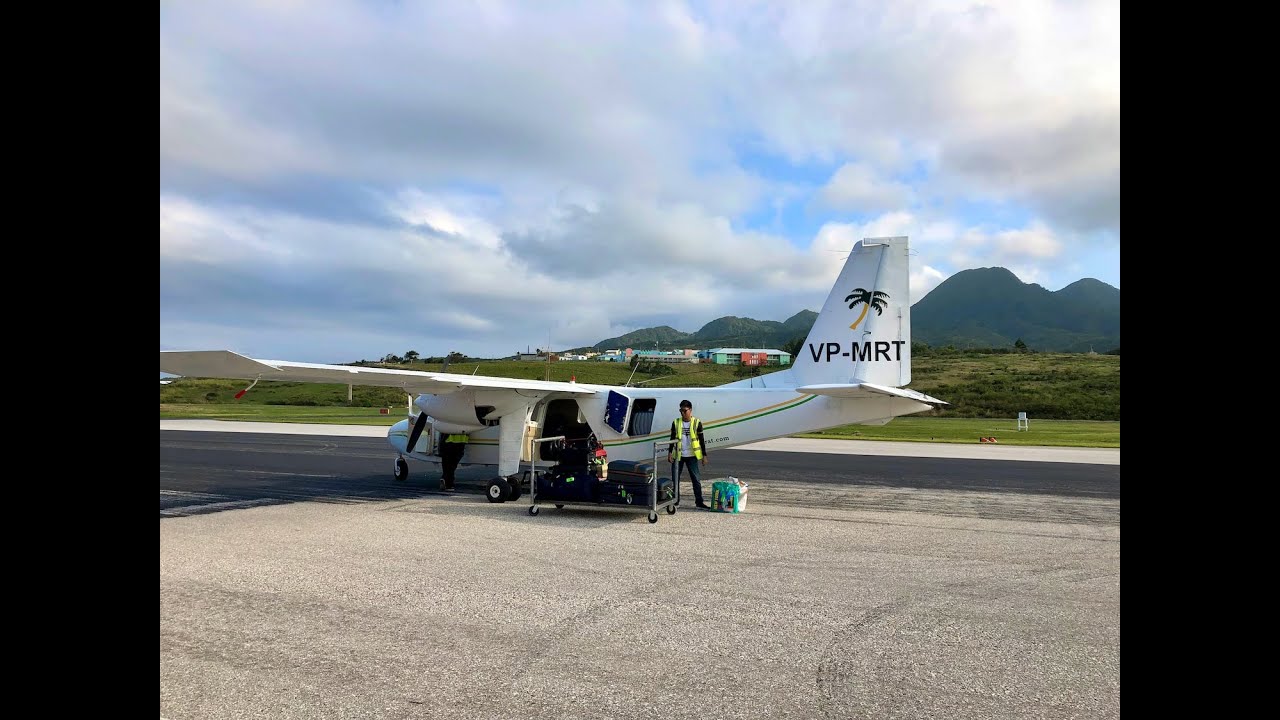 Views of the Montserrat coastline via Fly Montserrat flight from Antigua.