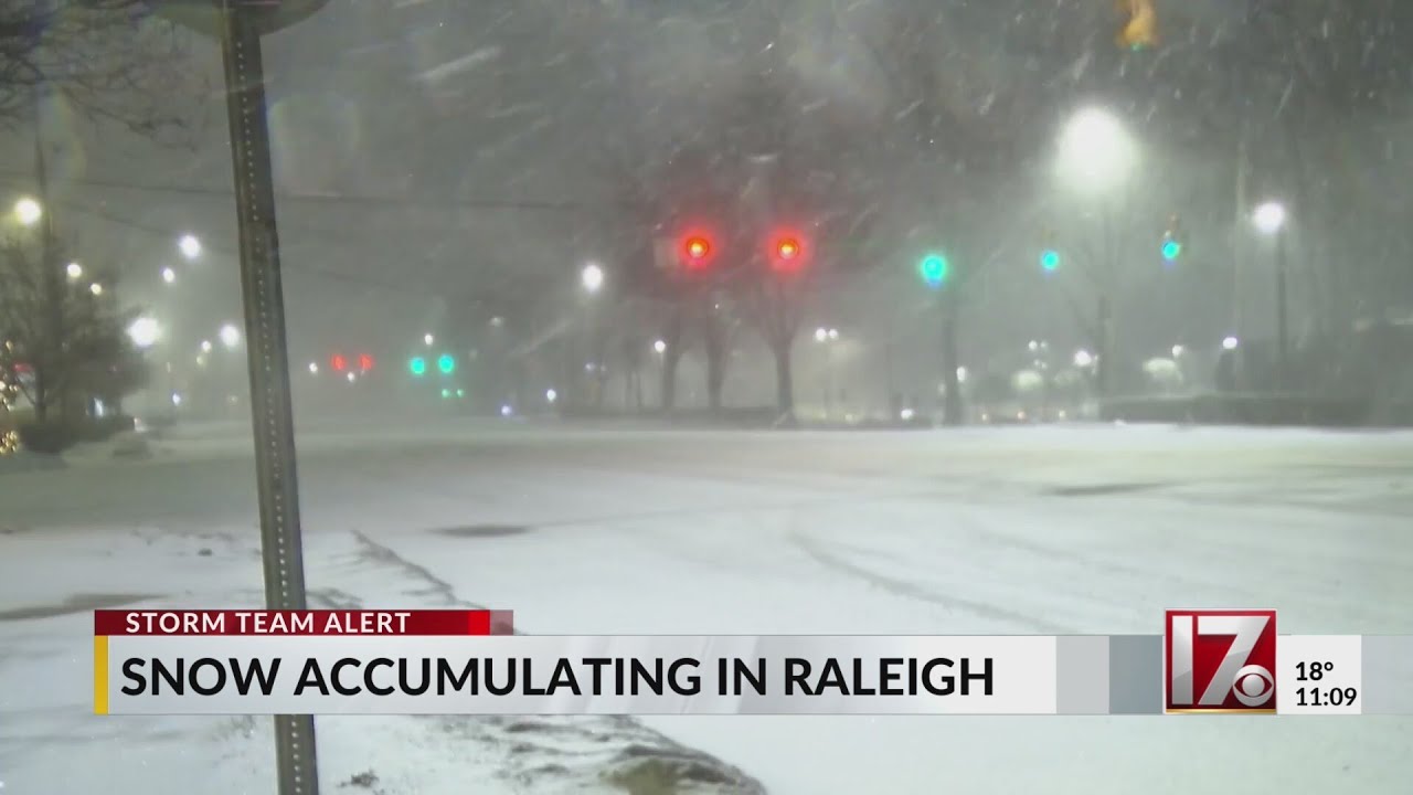Snow accumulating in Raleigh