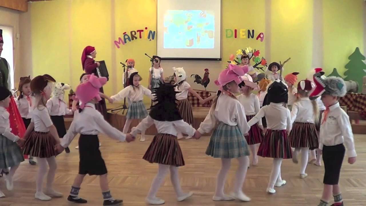 Latvian folk game “Skic, kaziņa, mežiņā’’ (“Shoo, shoo, little goat”)