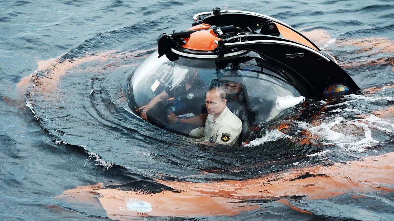 Russian President Vladimir Putin pays visit to Crimea in a submarine | usa today | putin biden