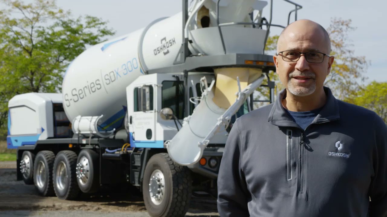 Electric Vehicles - Front discharge concrete placement vehicle
