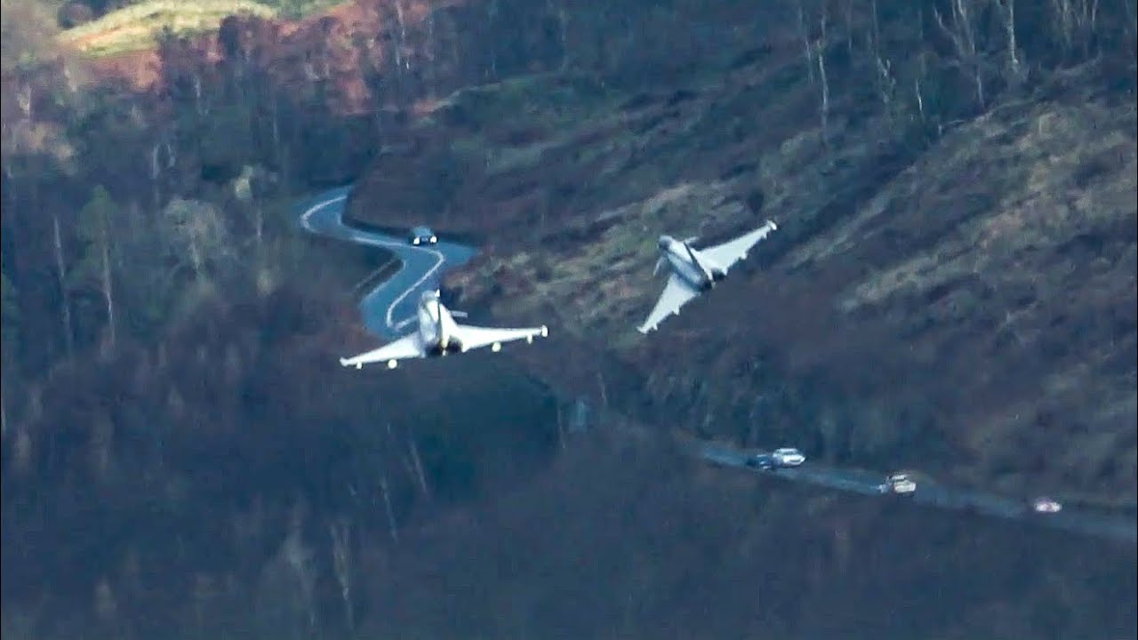 RAF Typhoons and F35 fighter jets LOW flying and close formation through The Lake District  UK!!