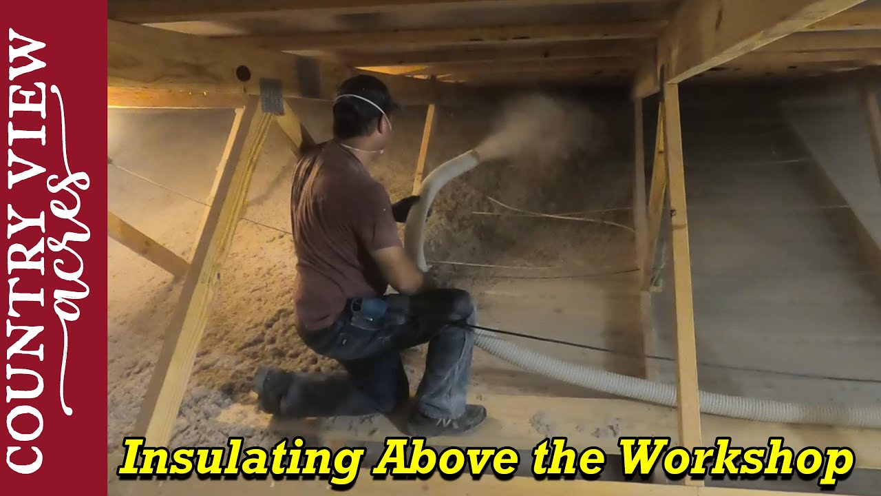 One step closer to a warm workshop this winter.  Installing Blown in insulation above the workshop