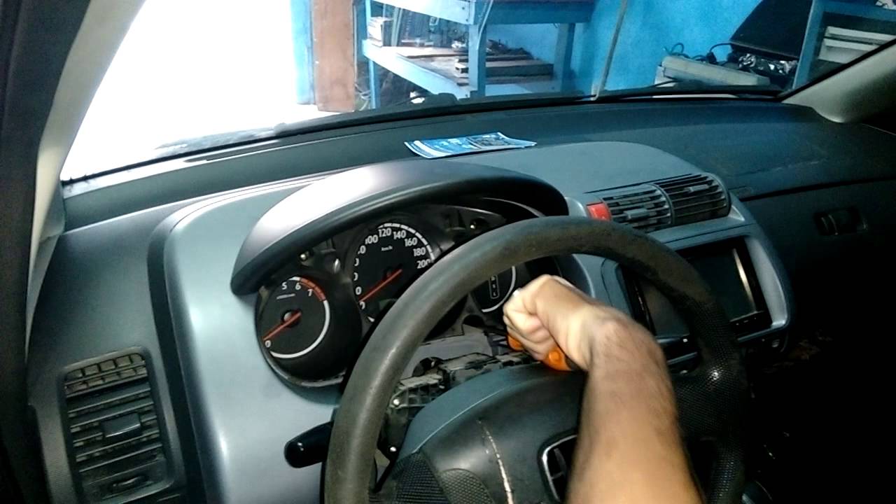 Como desmontar o painel do honda fit .