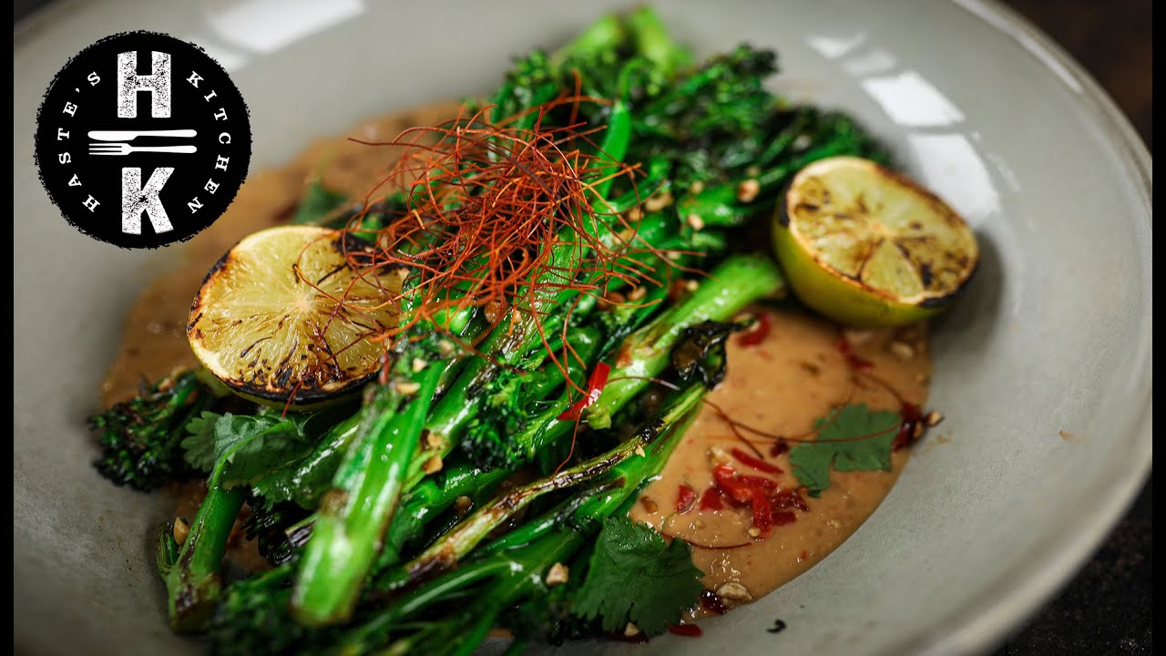 Charred Tenderstem® broccoli with a spicy satay sauce, chopped nuts, chilli and coriander.AD