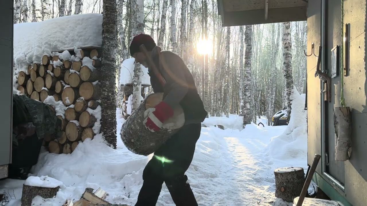 splitting wood at sunrise, 10:00 a.m. ish, things are warming up marginally