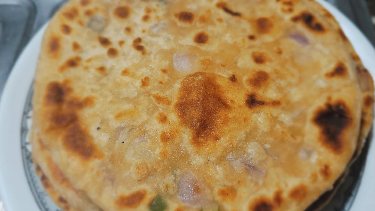 পিঁয়াজের পুর ভরে এই ভাবে পরোটা বানাও বার বার খেতে ইচ্ছে করবে। দারুন টেস্টি রেসিপি।