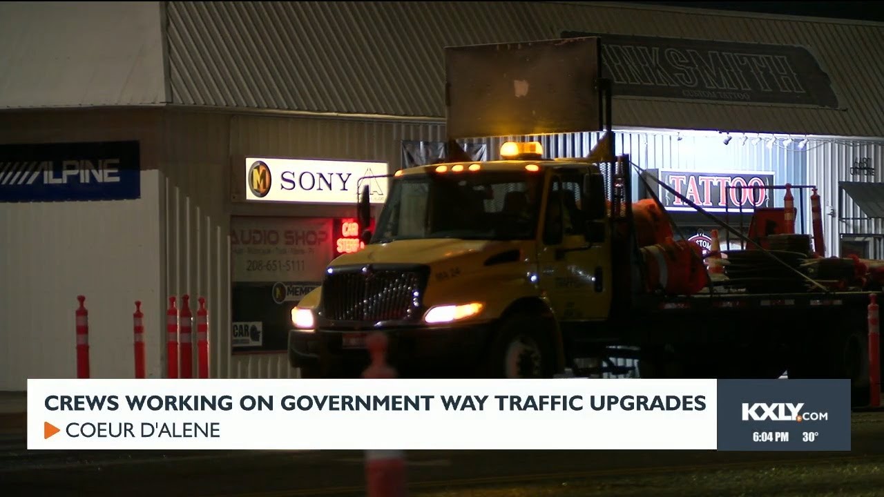 Construction crews working on Government Way in CDA