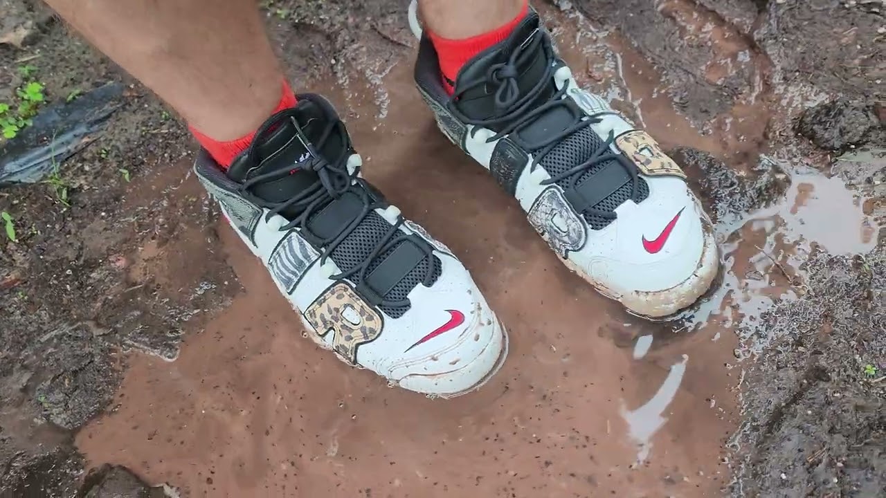 Brand new Nike Uptempo straight into the mud puddle