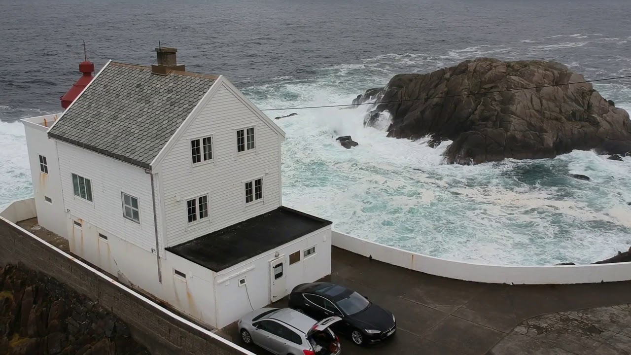 The Kråkenes lighthouse and Refviksanden beach