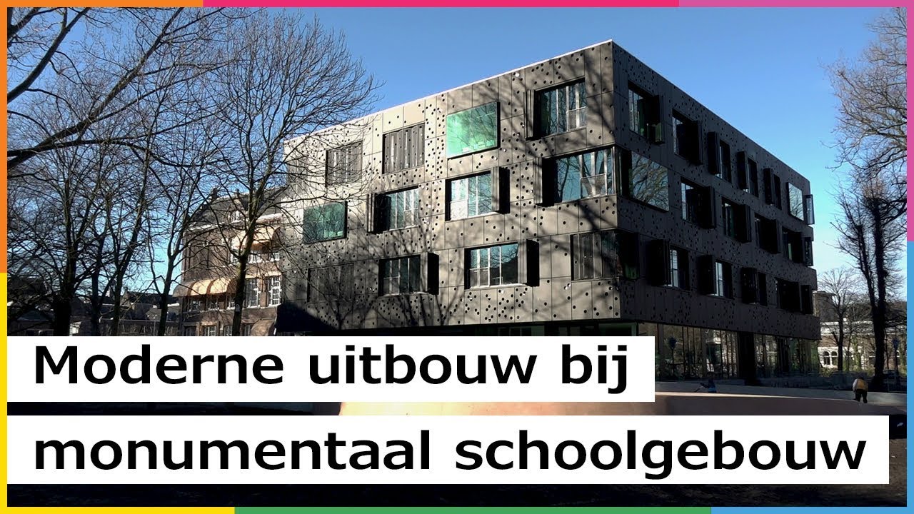 Moderne aanbouw bij monumentaal schoolgebouw